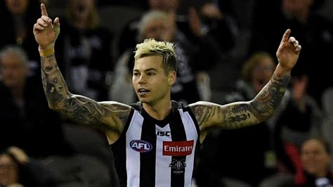 Report: Injury-plagued Collingwood star Jamie Elliott has re-signed ...