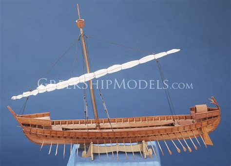 a wooden model of a boat on display