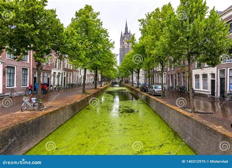 Old Church Oude Kerk and Delft Canals, Netherlands Editorial Image - Image of dutch, green ...