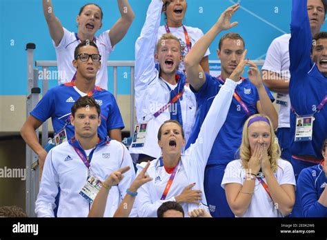 France's Florent Manaudou (L) and his sister Laure Manaudou celebrate ...