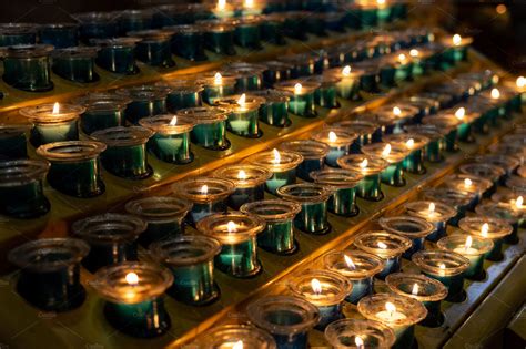 collection of candles on a catholic church | Architecture Stock Photos ~ Creative Market