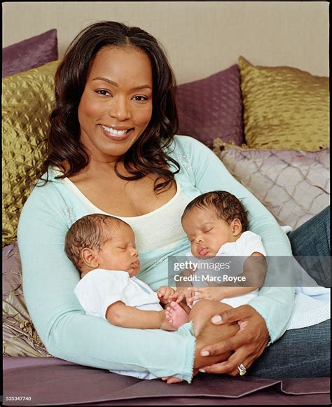 Angela Bassett with her newborn twins, Bronwyn and Slater. News Photo - Getty Images