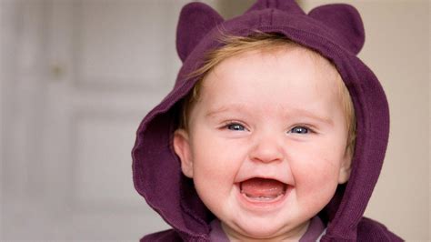 Smiley Ash Eyes Cute Baby Is Wearing Dark Purple Dress In Blur Background Cute HD desktop ...