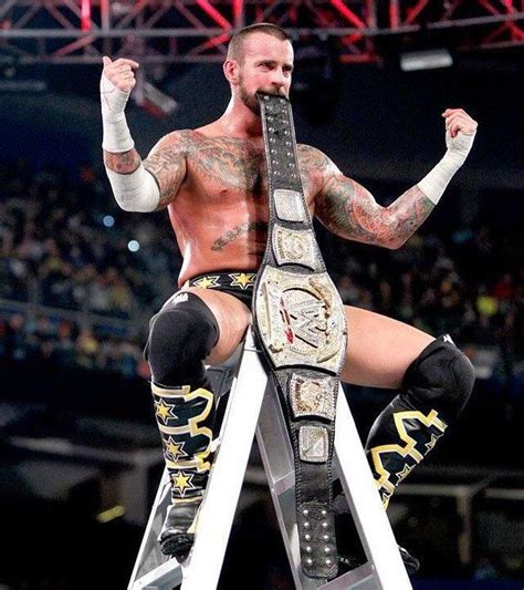 CM Punk with the WWE Championship after a TLC Match : r/SquaredCircle