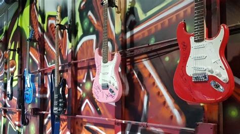 Autographed guitars stolen from Edmonton charity recovered at Calgary pawn shop | CBC News