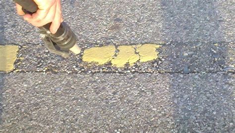 Pavement Marking Removal - Pavement Marking and Line Striping Professionals