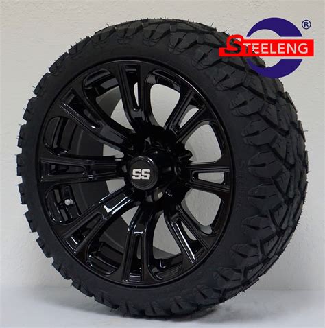 14" BLACK VOODOO WHEELS and 20"x8.5"-14" PERFORMANCE ALL TERRAIN TIRES