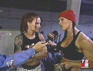 CHYNA NEWS: TODAY IN HISTORY: RAW IS WAR - CHYNA AND LITA VS. IVORY AND MOLLY HOLLY