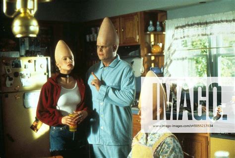 1993 Coneheads Movie Set PICTURED MICHELLE BURKE as Connie Conehead, DAN AYKROYD as Beldar Conehead