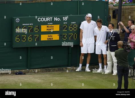 John isner and nicolas mahut hi-res stock photography and images - Alamy