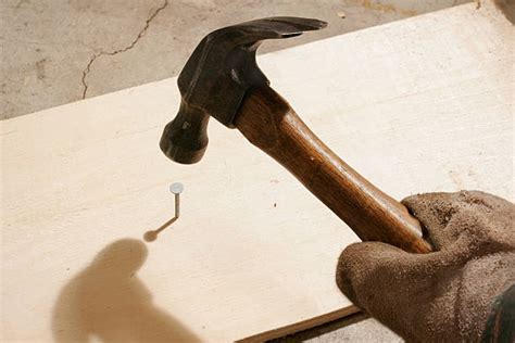 Hammer Hitting Nail Stock Photos, Pictures & Royalty-Free Images - iStock