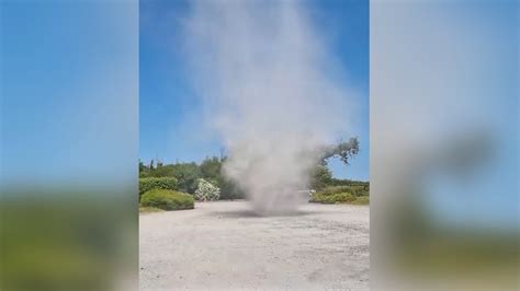 Woman left shocked as dust devil sweeps through Bluestone resort car park in Pembrokeshire | ITV ...