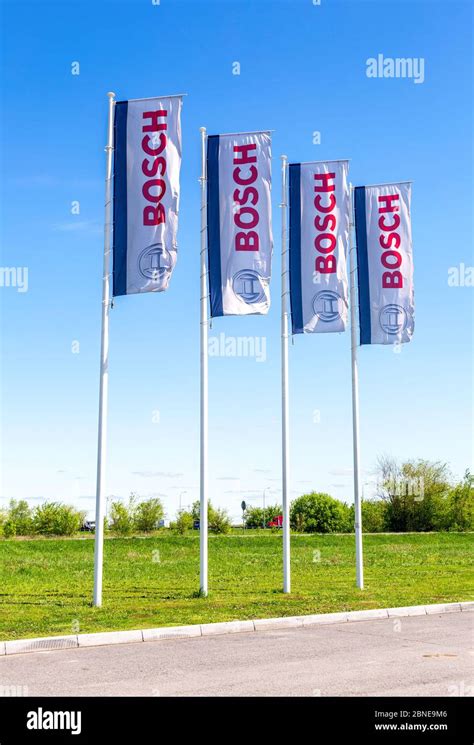 Samara, Russia - May 14, 2020: Flags with emblem Bosch against the blue ...