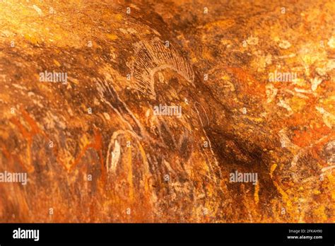 Rock art at Uluru Stock Photo - Alamy