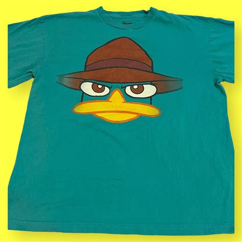 Perry the Platypus from Phineas and Ferb Blue/Green... - Depop