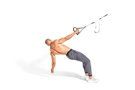 The TRX Reach-Row Bodyweight Back Exercise to Build Muscle