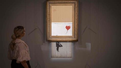 Banksy's self-destructing artwork sold for £ 18.5million, a record for ...