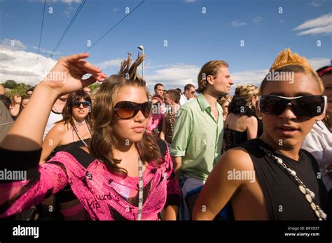 Portrait of a young man wearing big sunglasses at Street Parade (the most attended technoparade ...