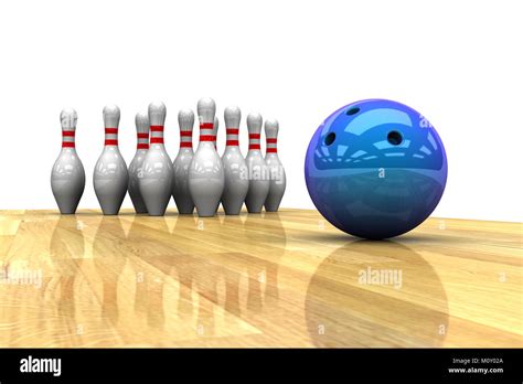 metallic blue bowling ball approaching a group of bowling pins, on a ...