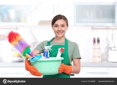 Woman Uniform Cleaning Supplies Indoors Stock Photo by ©NewAfrica 201088686