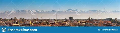 Panorama of Marrakech City Skyline with Atlas Mountains in the ...