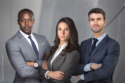 Strong serious group of lawyers team portrait pose, confident, determined, successful, powerful ...