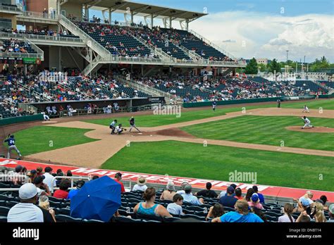 Isotopes (white uniforms) baseball game, Isotopes Park, Albuquerque Stock Photo: 64799200 - Alamy