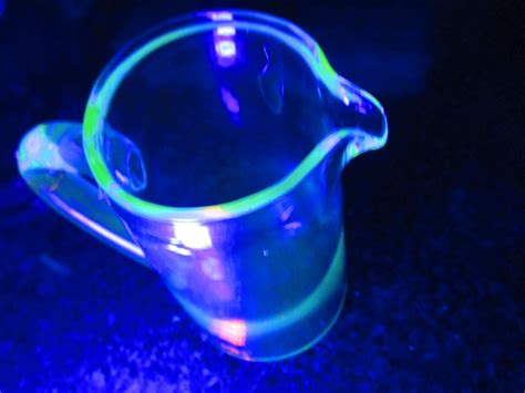 Fantastic Uranium Glass Pitcher with applied handle glows green under ...