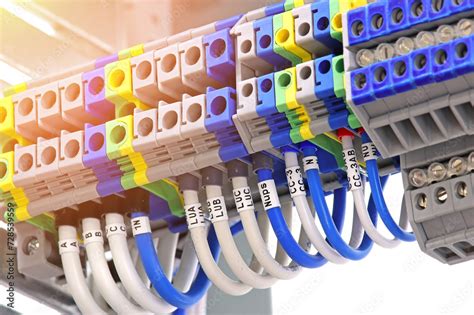 Electrical pass-through terminals for connecting copper mounting wires ...