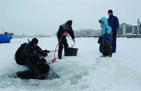 3. Suomenlinna during the winter. Scientific diving from the top of the ...