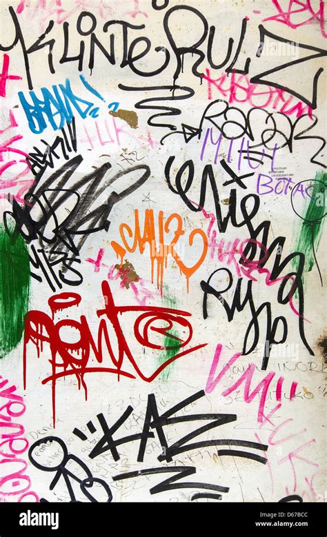 Graffiti on white wall Stock Photo - Alamy