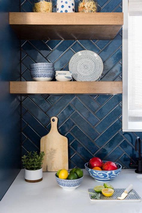 HGTV features open wood shelving in this fun kitchen. Blue subway tile ...