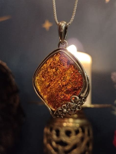 Temple of Goddess Anumati Cosmic Millionaires Club Baltic Amber Pendant ...