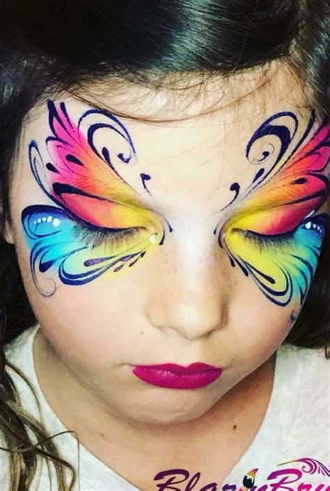 Butterfly with Rainbow Base and fine black swirls and teardrops | Face painting designs ...