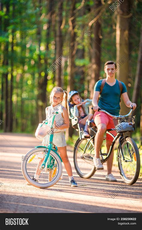 Happy Family Biking Image & Photo (Free Trial) | Bigstock