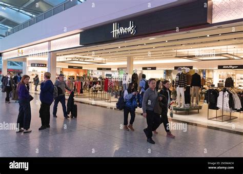 Airport shops UK; The Harrods store, exterior, Terminal 5, Heathrow airport London UK Stock ...