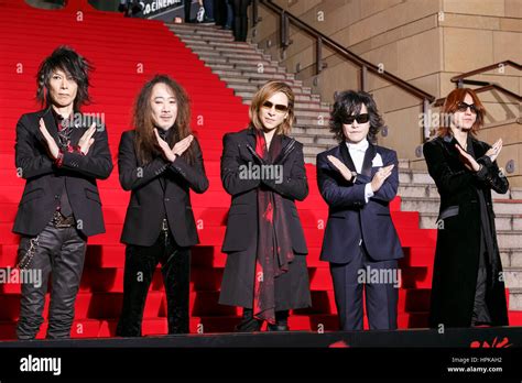 Members of rock band X Japan pose for cameras during the red carpet ...