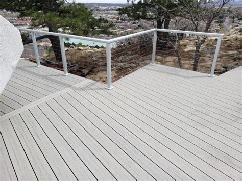 Horizontal cable railing with Deckorators Voyage Tundra decking - Contemporary - Other - by ...