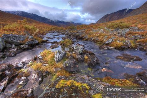 Water of rocky Klondike River flowing in meadow of Tombstone Park, Yukon, Canada — scenery ...