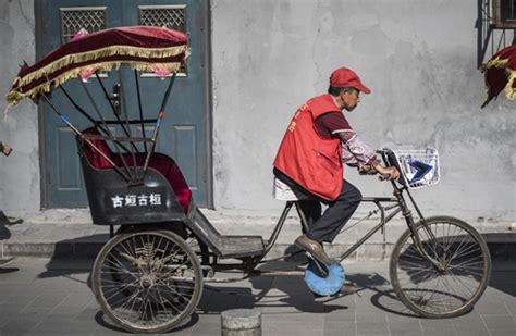 The Everyday Struggle of Beijing's Rickshaw Drivers – Thatsmags.com