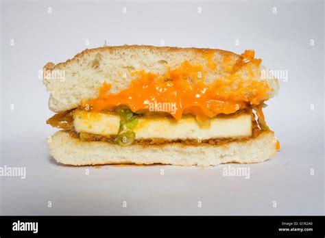 McSpicy Paneer burger cross section Stock Photo - Alamy