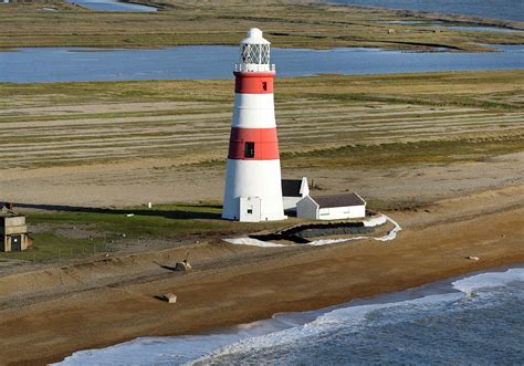 Photos reveal how coastal erosion dramatically eats away at Britain’s ...