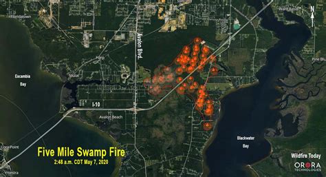 Wildfire burns structures and closes I-10 south of Milton, Florida ...