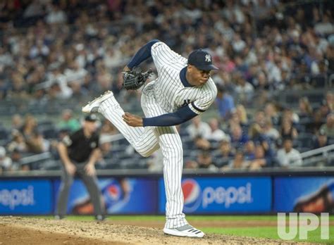 Photo: New York Yankees relief pitcher Aroldis Chapman (54) pitching in the 9th inning ...