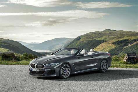 The new BMW 8 Series Convertible in colour Dravit Grey metallic and 20 " M wheels Multi-spoke ...