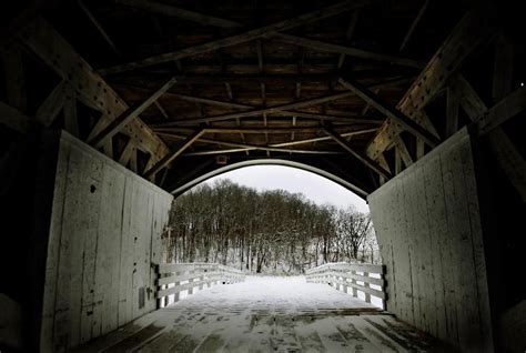 The Roseman Covered Bridge is seen in Winterset, Iowa. Madison County. Madison County, Old Barns ...