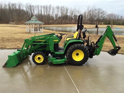 2004 John Deere 4310 4x4 TLB, Mid Mower