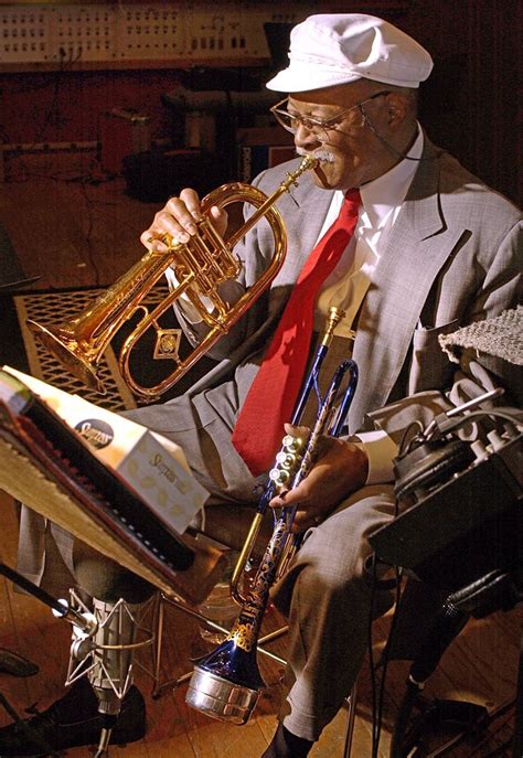 Legendary trumpeter and composer Clark Terry seen playing two horns on ...