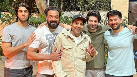 Dharmendra smiles big as he celebrates Lohri with son Bobby Deol and ...