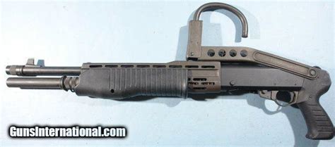 FRANCHI FIE MIAMI SPAS-12L OR SPAS 12 FOLDING STOCK PUMP OR SEMI TERMINATOR SHOTGUN WITH ARM HOOK.